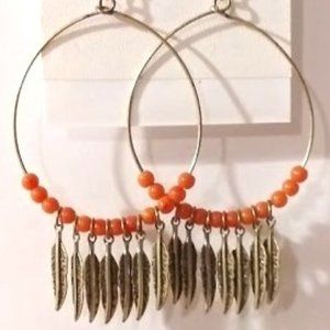 NWT gold hoops with orange beads and feathers